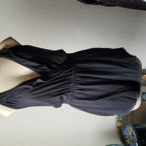 Like new, Romper black with ruffle and trim so cute split up the sides of short - Picture 2 of 7